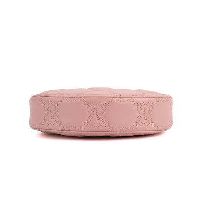 Gucci Sac à bandoulière en cuir matelassé GG rose