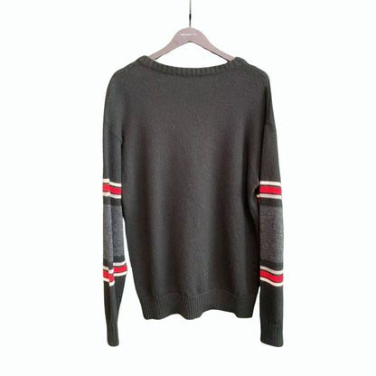 Pull en laine Yves Saint Laurent T Rex Dino